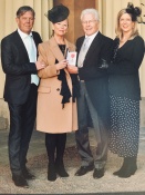 Mike and his family at Buckingham Palace on the occasion of his MBE award