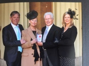 Mike and his family at Buckingham Palace on the occasion of his MBE award