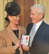 Mike with May, his proud wife, on the occasion of his MBE award at Buckingham Palace